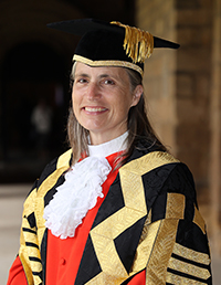 Dr Fiona Hill in chancellor robes
