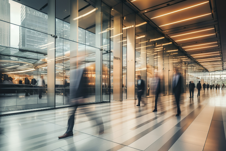 People walking next to an office building