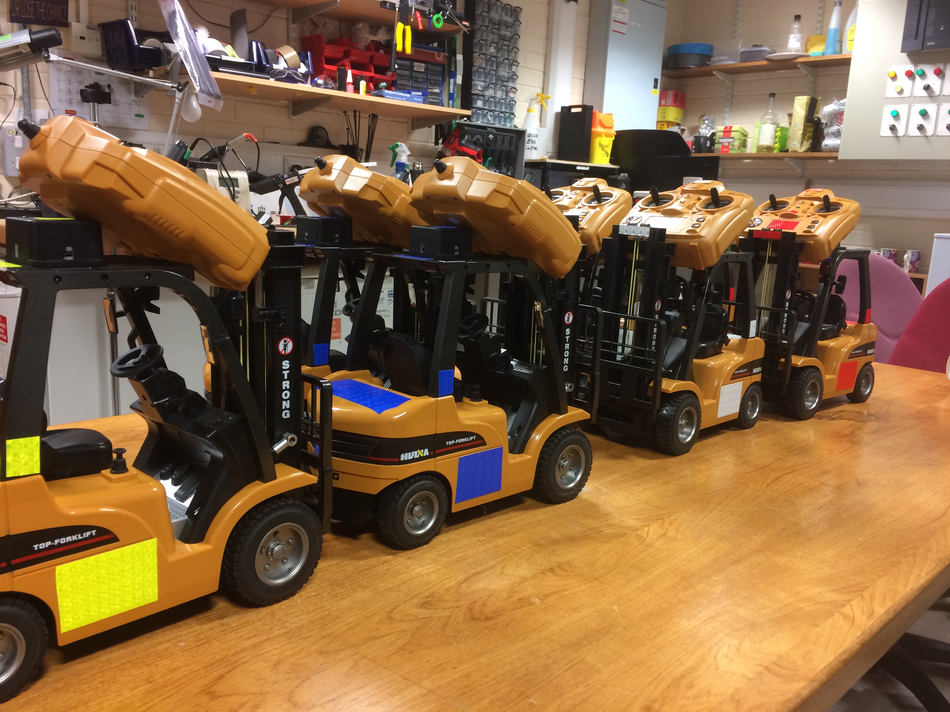 A group of Battlebot Forklift trucks lined up