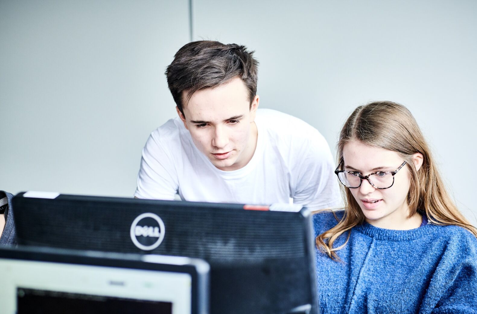 Students looking at a computer screen