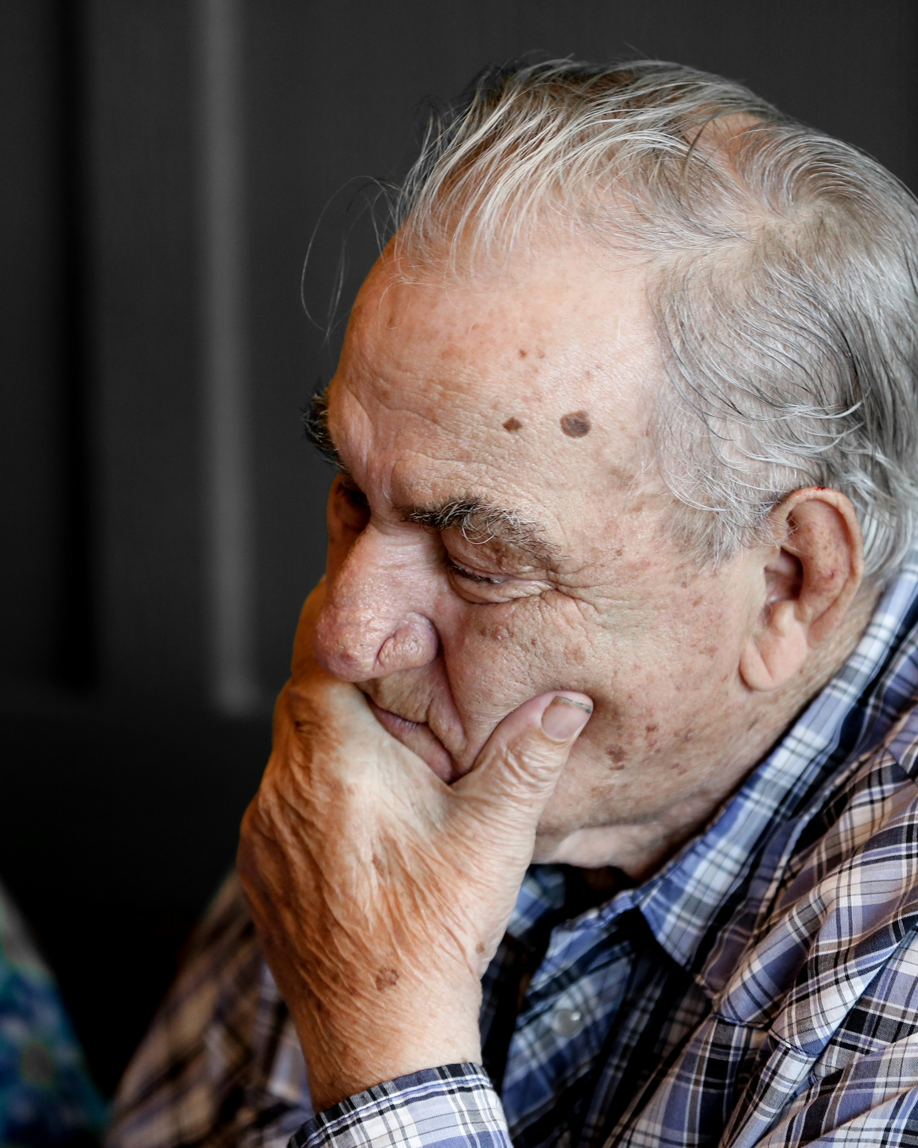 Older person looking worried