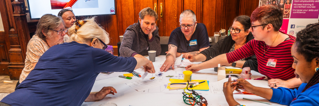 Workshop group around a table problem solving