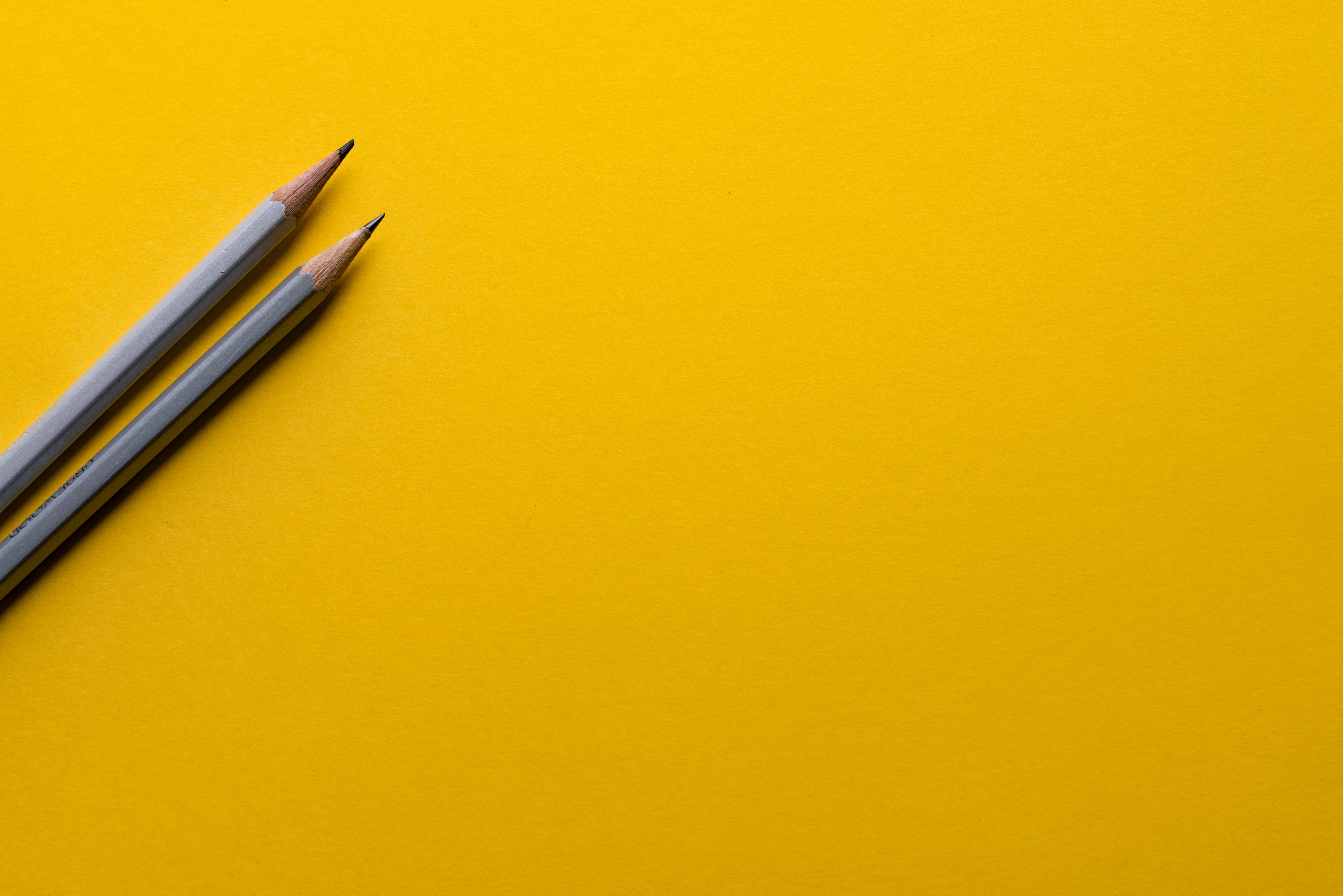 Pencils in yellow background