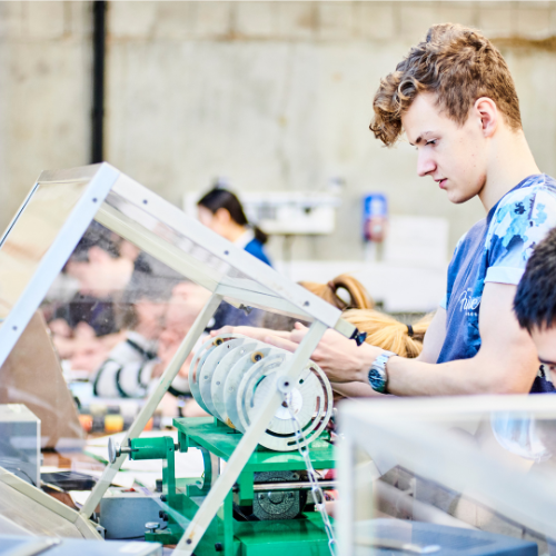 Student working with engineering facilities