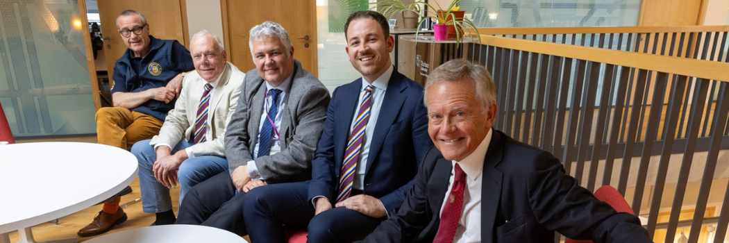 5 men seated: Duncan Maw, Philip Twizell, Professor Clive Roberts, Alex King, Clinton Leeks