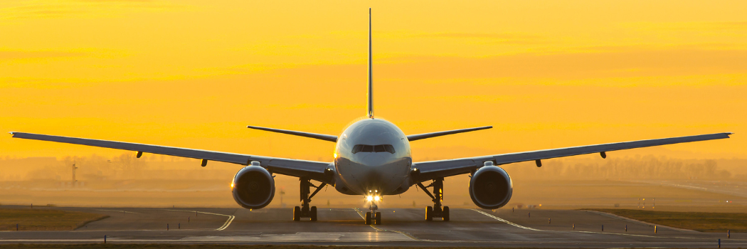 Front view of an aeroplane on the runway.