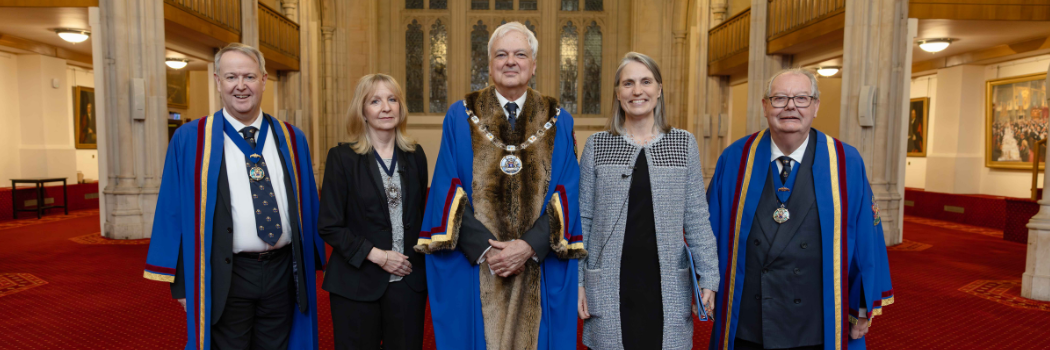 Dr Fiona Hill, Master Richard Burge, Lady Mayor and two mean standing smiling to camera