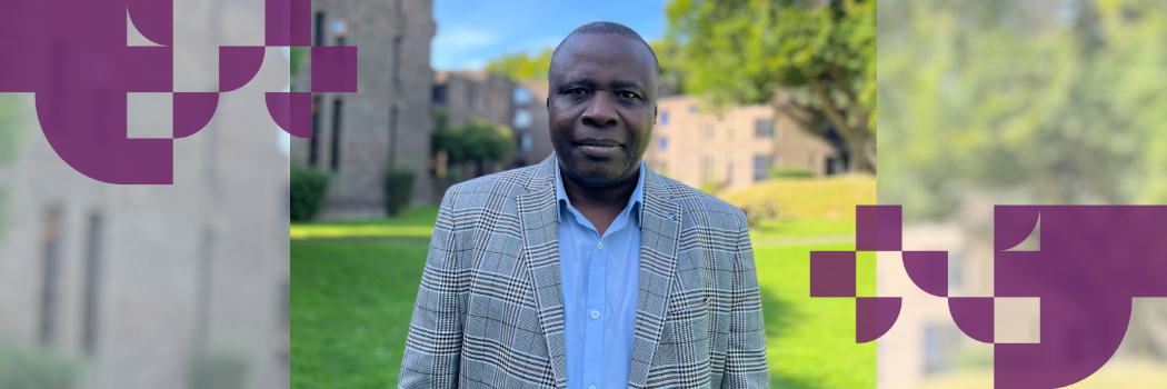 Professor Adeyeye standing outside in a blazer and shirt