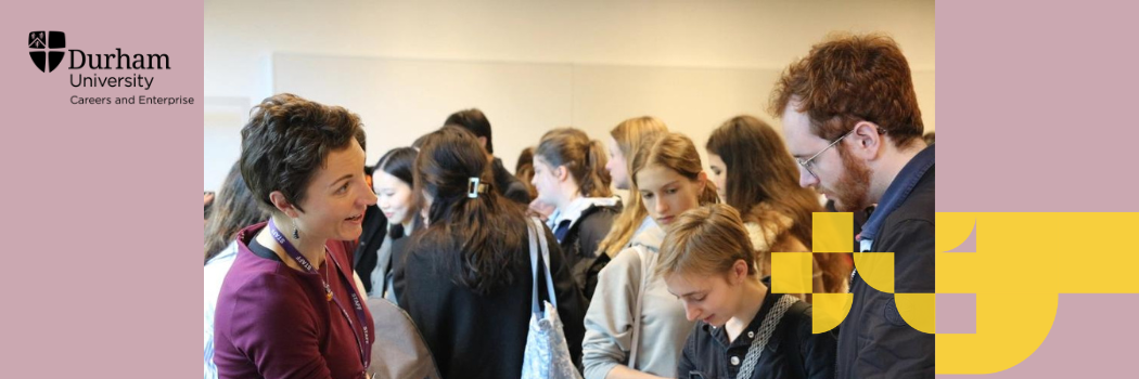 A group of students talking to a member of staff / company representative