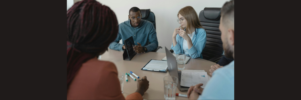 Researchers at a business meeting