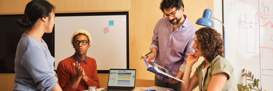 Diverse team collaborating in modern office