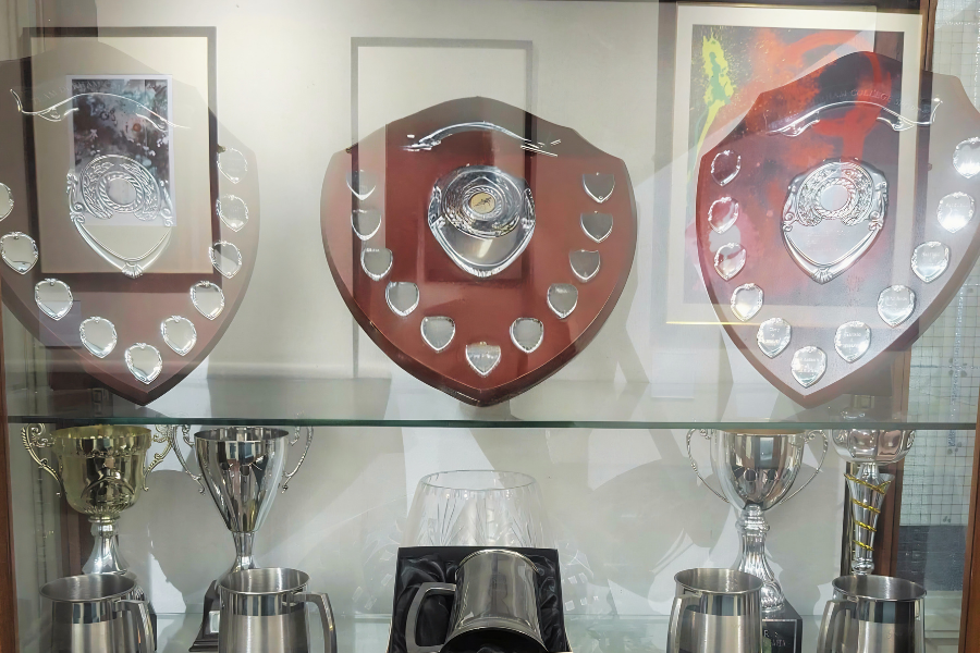 A photo of some of the trophies in the trophy cabinet at Grey College