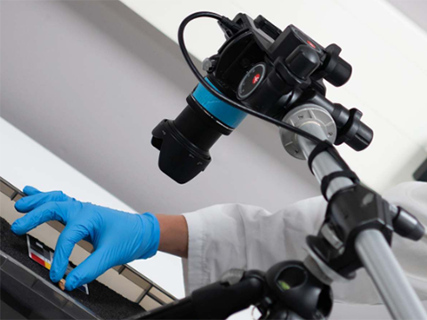 Person using a specialist lab scanner