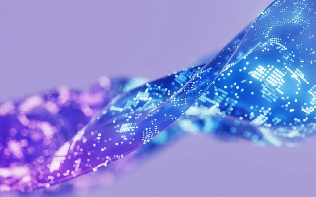 Stream of blue purple liquid containing light spots