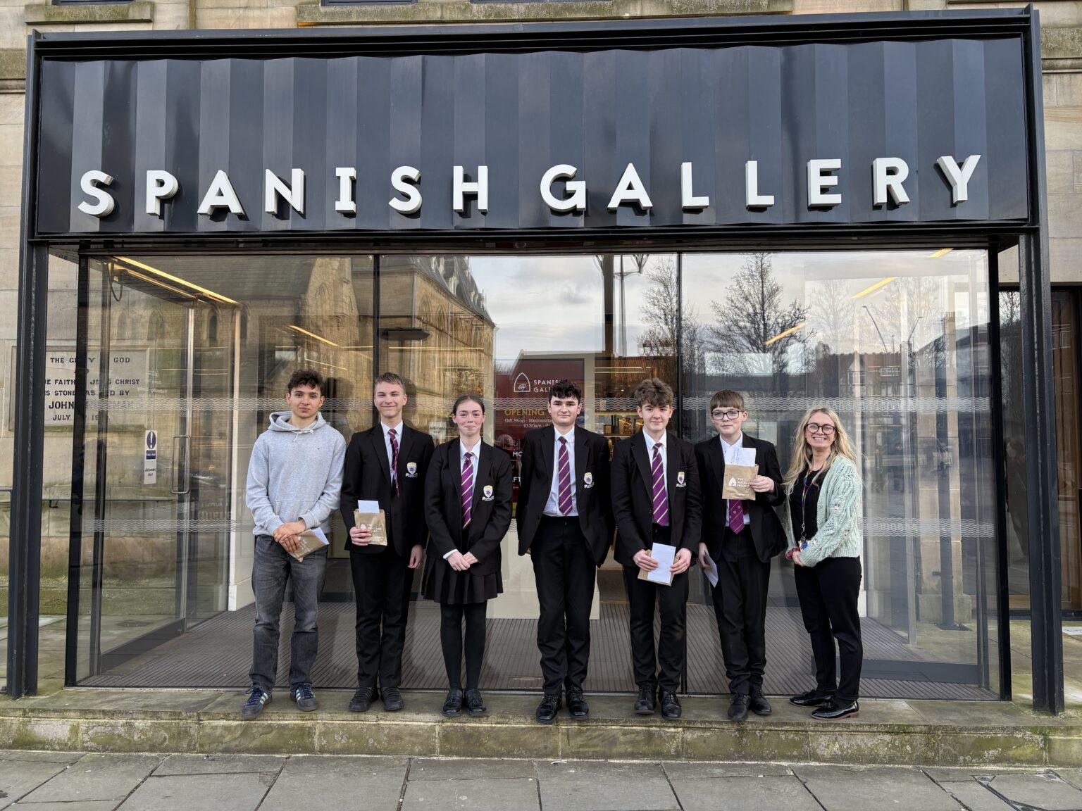 a group of pupils outside the Spanish Gallery in Bishop Auckland