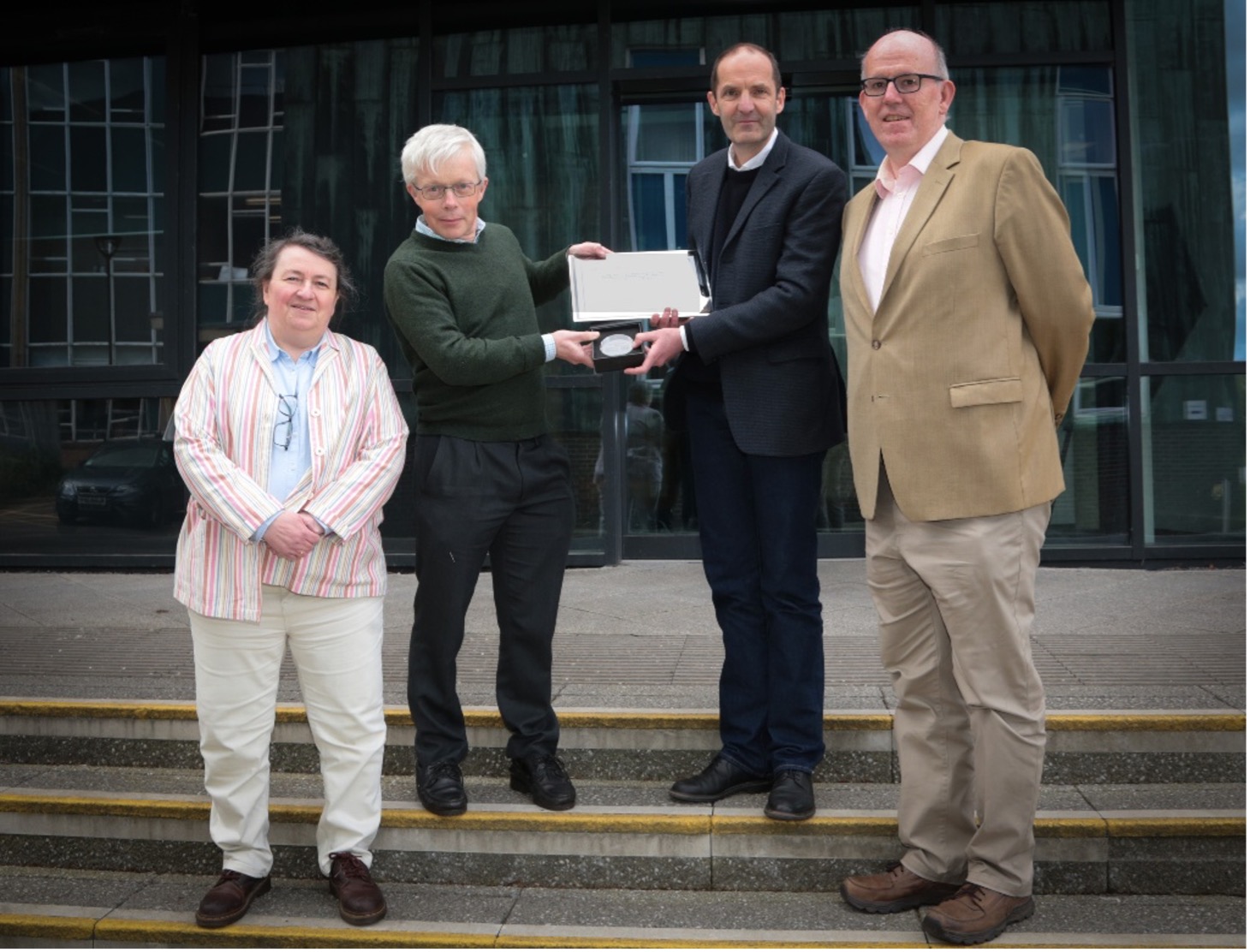Group photo showing Charles Adams (second from left) receiving the Holweck prize from Antoine Browayes  of the French Physical Society. Flanking them on the left is Prof Paula Chadwick and on the right Prof Ifan Hughes.
