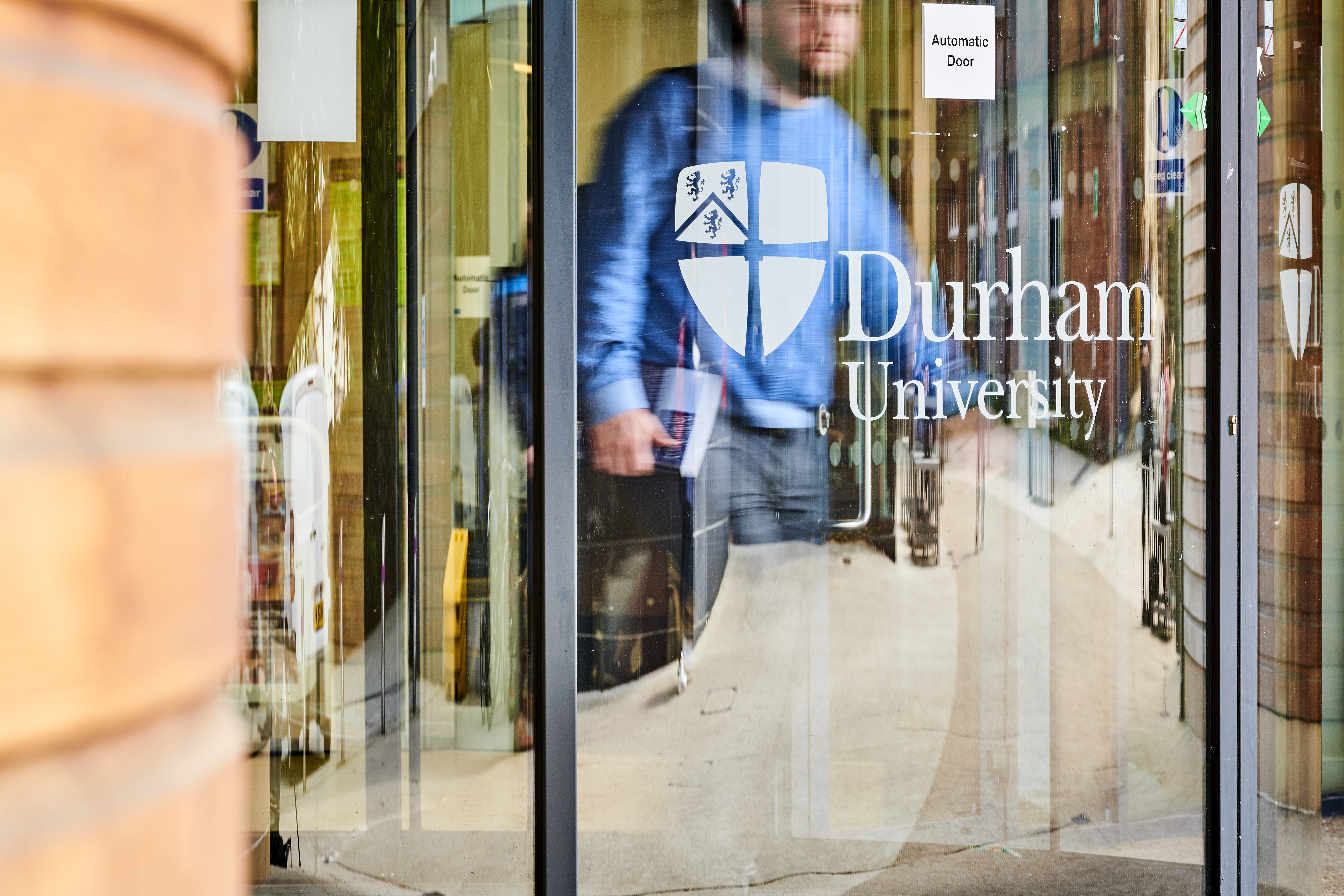Durham University entrance with logo on door