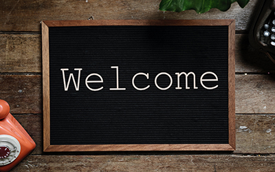 A chalkboard with 'Welcome' written on it