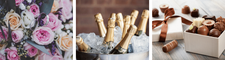 Flowers, champagne in an ice bucket and chocolates in an open box