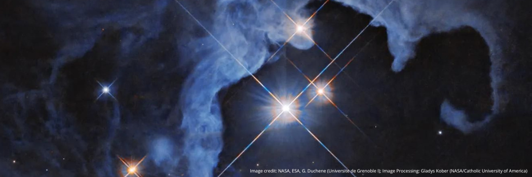 The NASA Hubble Space Telescope image captures a triple-star star system