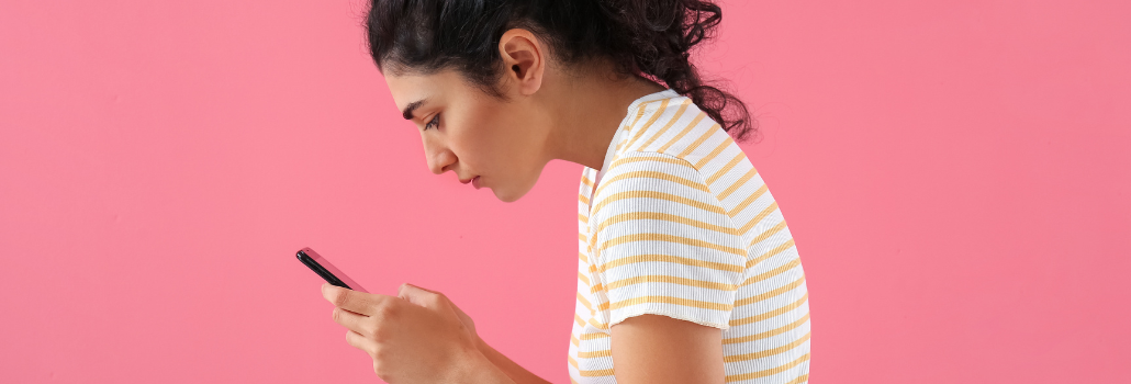 woman looking at a phone