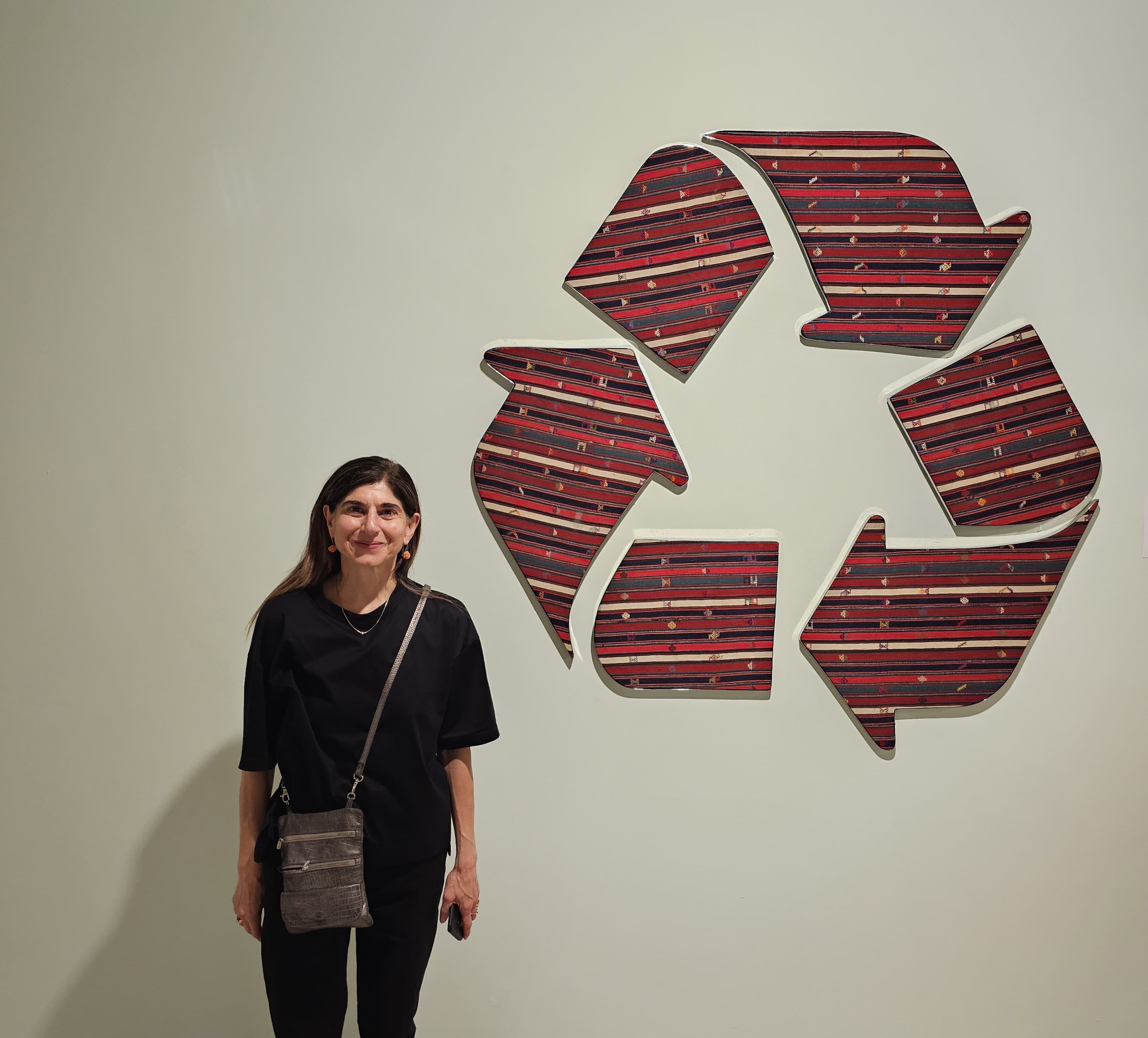 Lady in front of COP29 Museum display