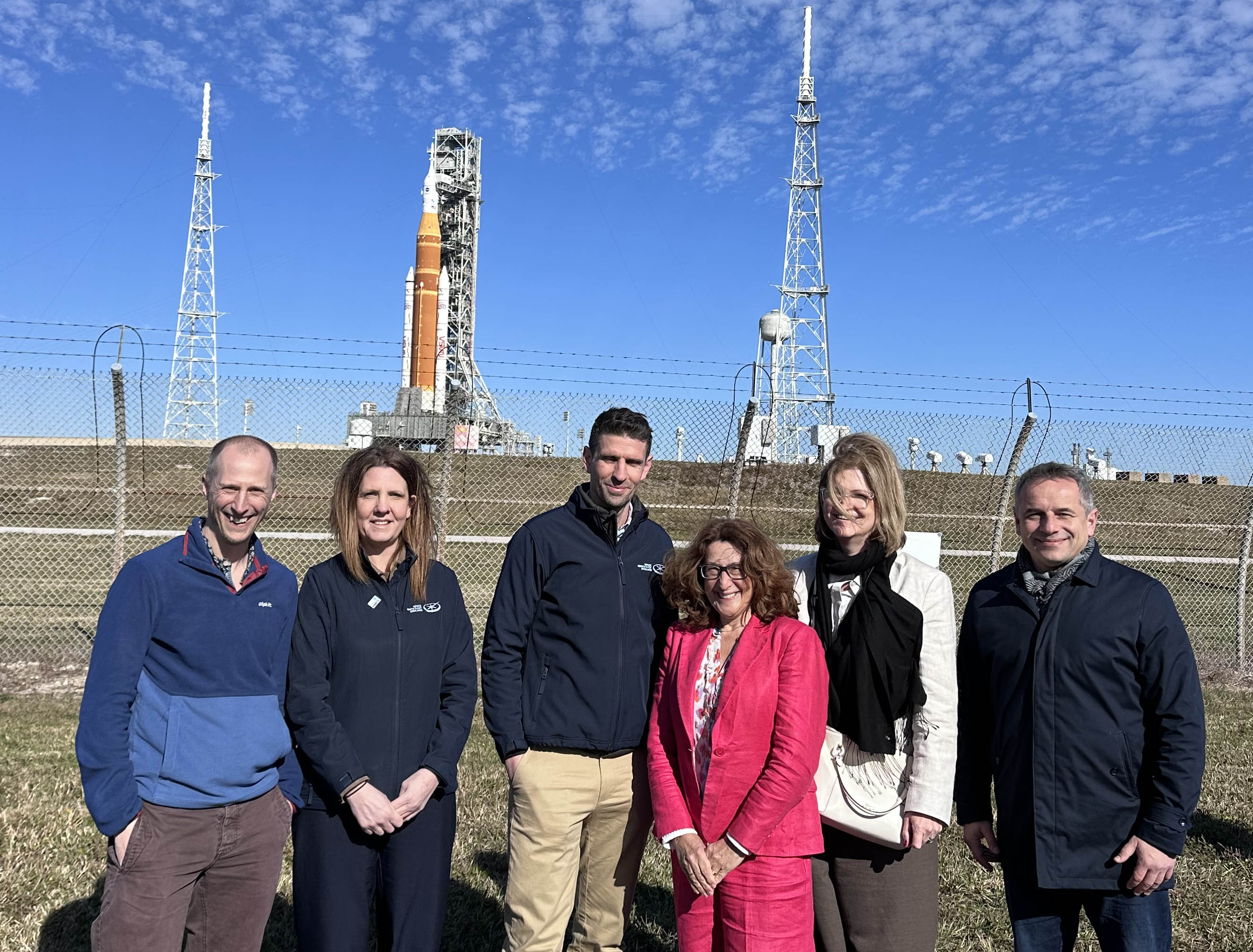 Trade visit to Florida, launchpad in background