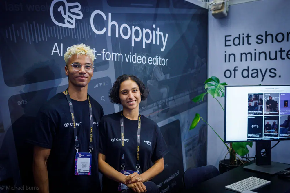 Aaron Morris and Zara Paul infront of Choppity advertising