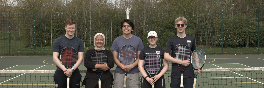 Students from ISC and Ustinov College pose with their tennis rackets following their game in the 2026 Varsity