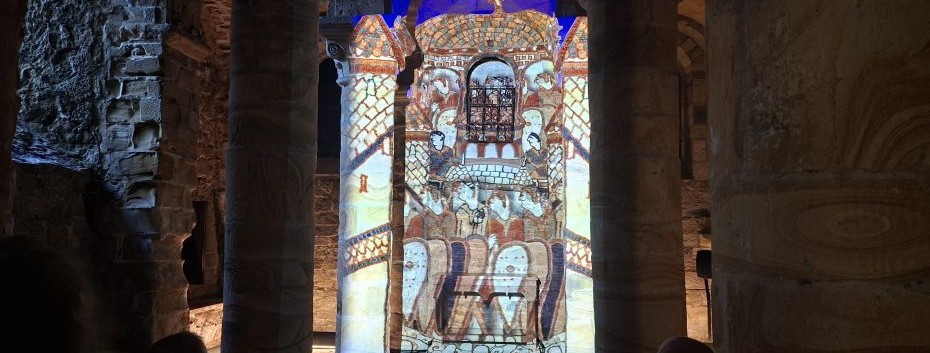 A view of the art projection showing Norman knights, onto stone pillars in the Norman Chaepl