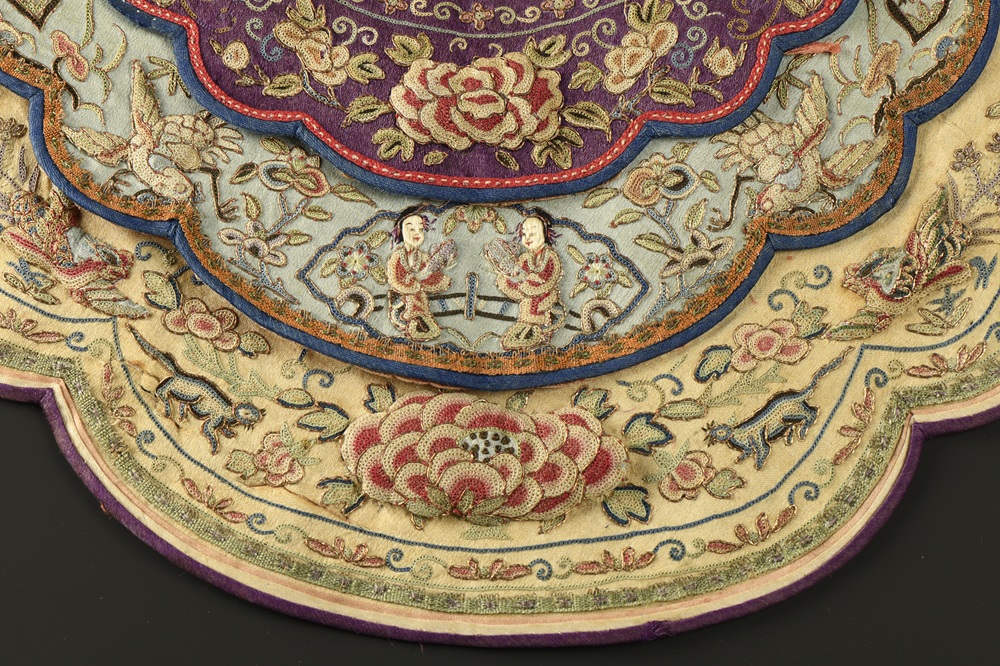 Heavily embroidered piece of textile